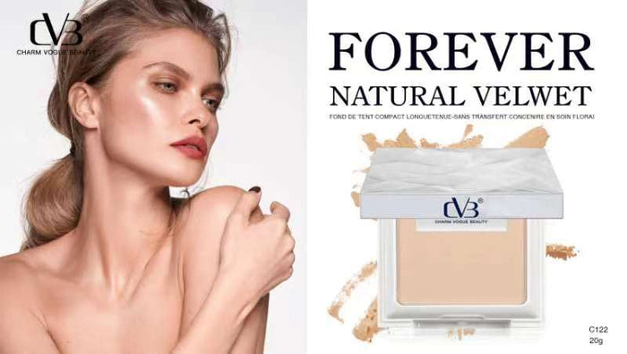 Model with makeup product labeled 'Forever Natural Velvet' by dvb