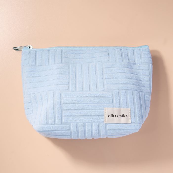 Ella's Essentials light blue quilted cosmetic pouch, front view
