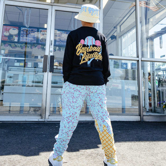 Youth model wearing ice Cream Pajama Pants Cotton Candy Blue youth pants