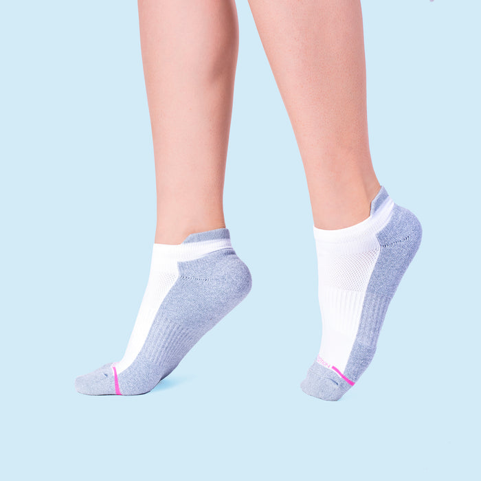 Ankle compression socks with a half-cushion design, featuring a mix of white and gray colors.