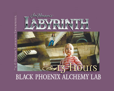 Promotional poster for 'Labyrinth' with a child on a staircase, featuring the Black Phoenix Alchemy Lab branding.