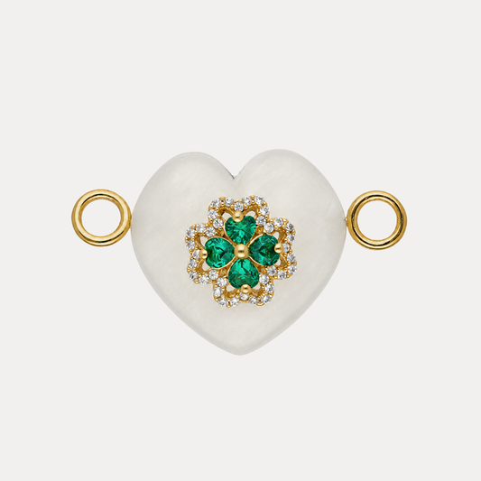 Clear Quartz Heart Charm with sparkling green crystal clover emblem and gold accents, elegant minimalist design.