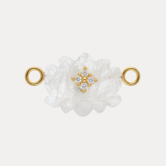 Clear Quartz Lotus Charm featuring a gold accent and clear pavé crystals, symbolizing renewal and spiritual rebirth.