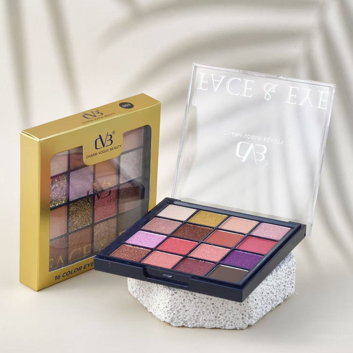 Makeup palette with open lid showing colors and closed gold box on a light background