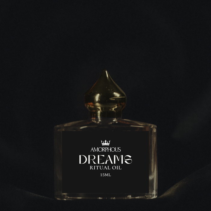 dreams ritual oil bottle on a black background