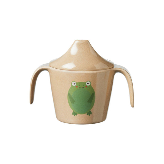 The Eco Rice Husk Two-Handle Cup is a beige sippy cup made from eco-friendly rice husk, featuring two handles, a lid, and a cute green frog illustration on the front, shown against a white background.