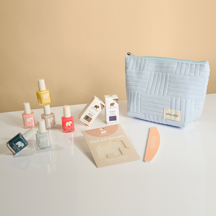 Ella's Essentials gift set: light blue quilted pouch with nail polishes, file, decals and cuticle oil