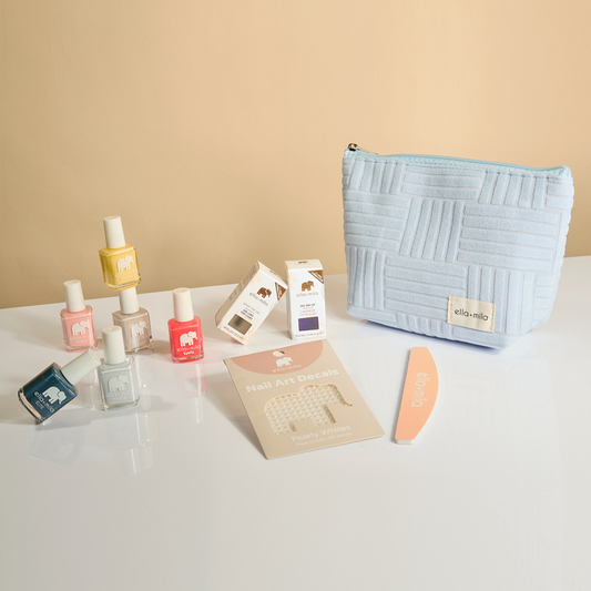 Ella's Essentials gift set: light blue quilted pouch with nail polishes, file, decals and cuticle oil