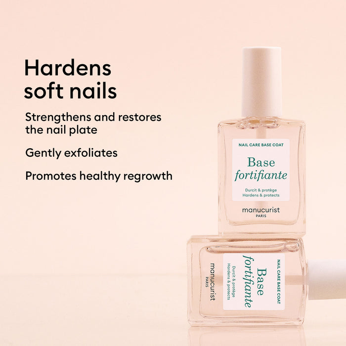 Two bottles of Manucurist Force Nail Hardener are displayed on a pink background, highlighting its benefits: hardens soft nails, strengthens and restores the nail plate, gently exfoliates, and promotes healthy regrowth.