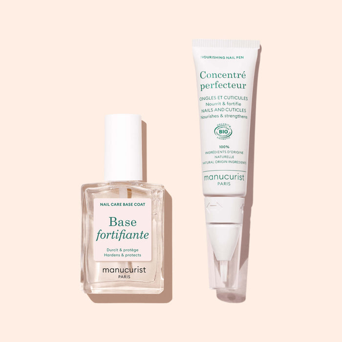 A clear bottle of Manucurist Force Nail Hardener and a white nourishing nail pen are displayed on a light beige background.