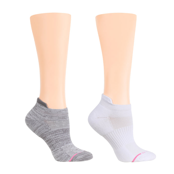 Two pairs of ankle compression socks, one gray with a pattern and one solid white, displayed on mannequin legs.