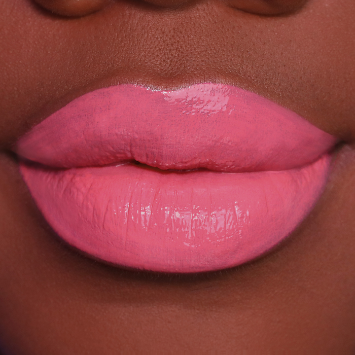 Creamy Lips It's Complicated rose pink lipstick on lips, medium-deep skin tone