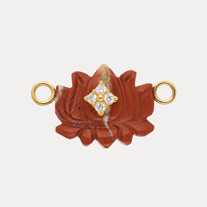 Jasper Lotus Charm featuring terracotta-red jasper and diamond-shaped gold accent with crystals.