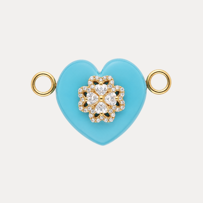 Laguna Stone Heart Charm featuring vibrant turquoise agate with a white-crystal clover emblem, symbolizing tranquility.