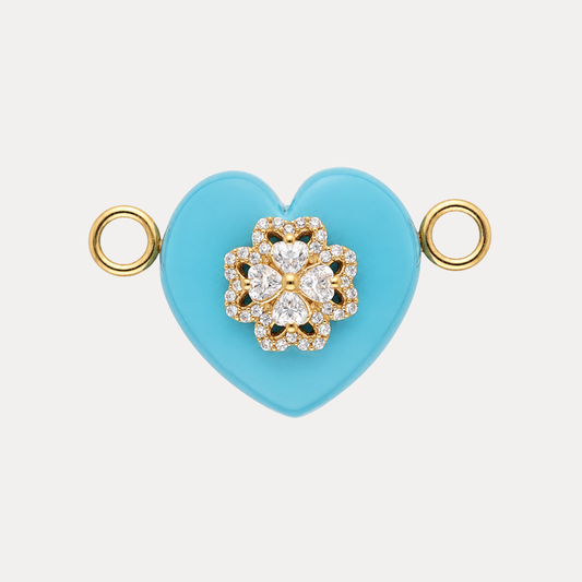 Laguna Stone Heart Charm featuring vibrant turquoise agate with a white-crystal clover emblem, symbolizing tranquility.