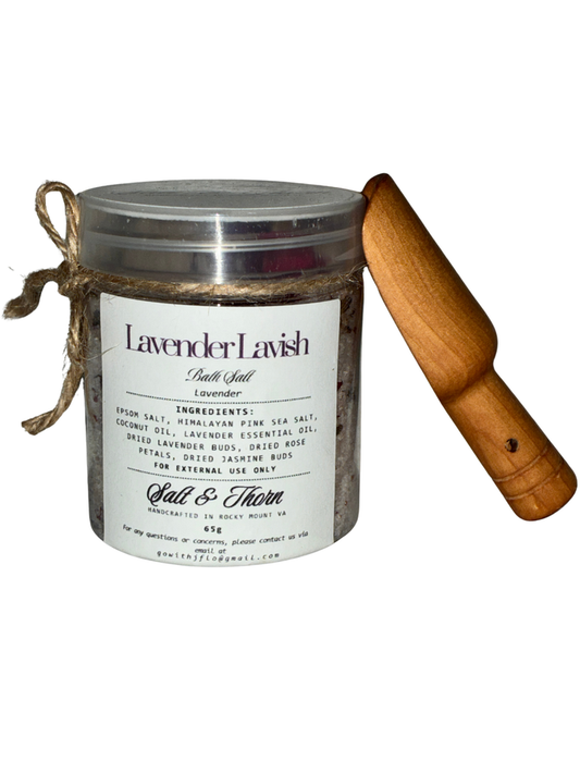 Lavender Lavish bath salt container with wooden scoop on a white background