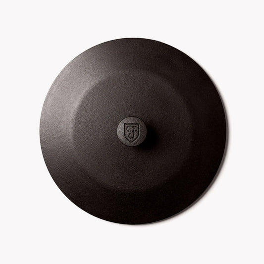 Overhead view of the No.10 Field Cast Iron Skillet Lid with shield-stamped center knob