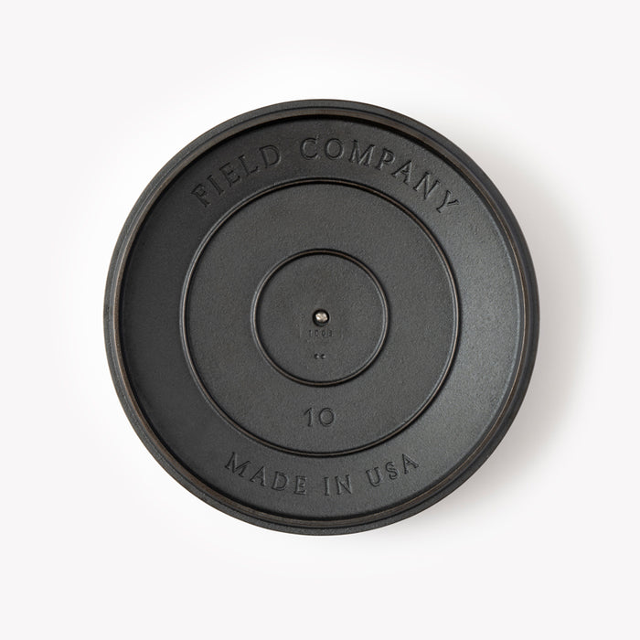 Underside of the No.10 Cast Iron Skillet Lid showing the Field Company and Made in USA stamps