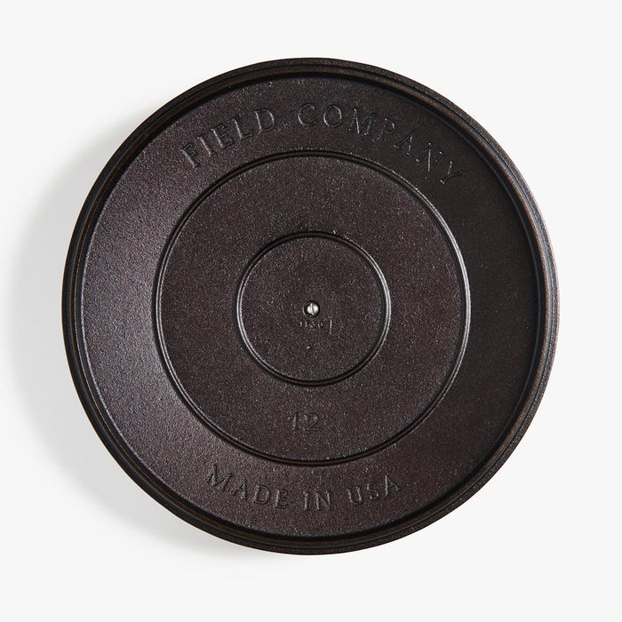 Underside of the No.12 Cast Iron Skillet Lid showing the Field Company and Made in USA stamps
