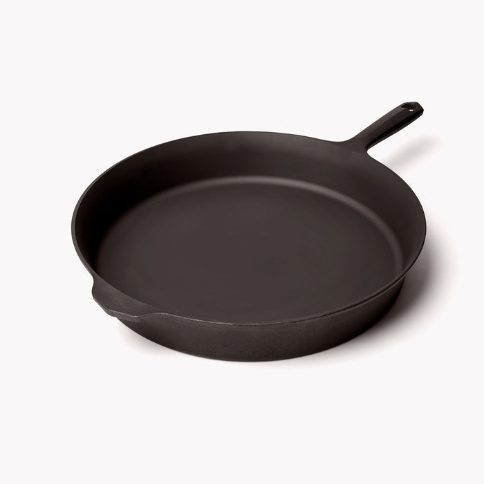 No.12 Field Cast Iron Skillet angled side view on white background showing sloped sides
