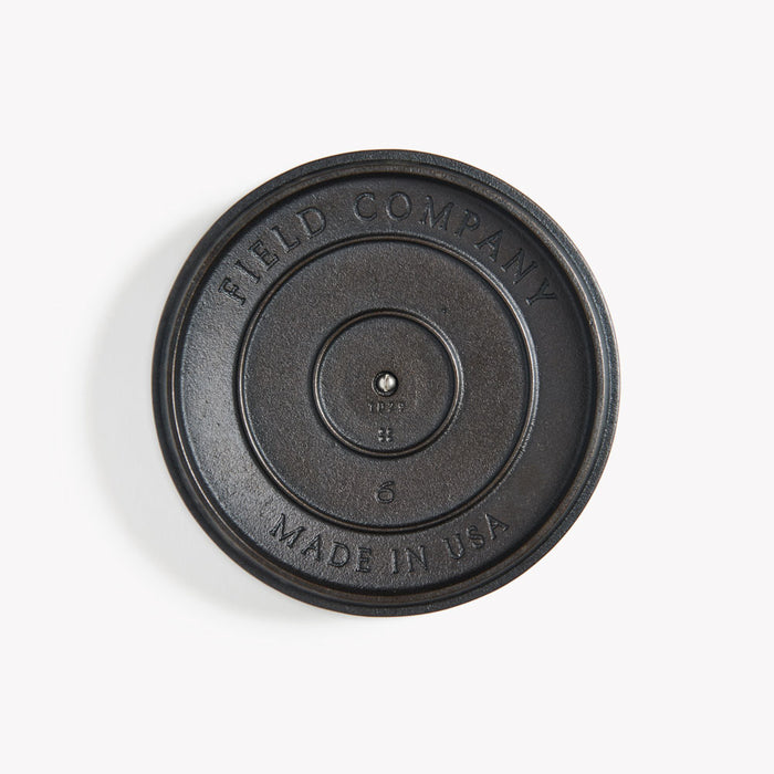 Underside of the No.6 Cast Iron Skillet Lid showing the Field Company and Made in USA stamps