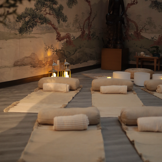 NOURISH: A Women's Wellness Conversation, Breathwork & Sound Journey setting with mats and calming decor.