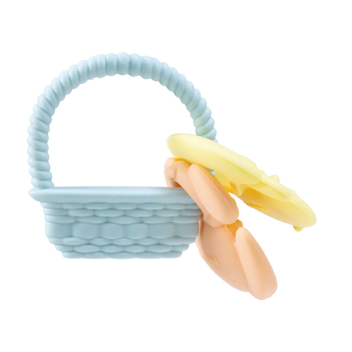 The Nuby Silicone Bunny Basket Teether is a pastel blue, basket-shaped teether with a textured handle and two attached pastel peach and yellow rings, designed for babies to hold and chew comfortably.