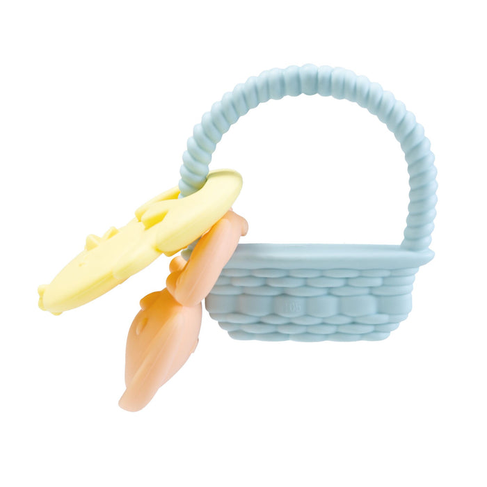 The Nuby Silicone Bunny Basket Teether features a light blue, woven-look basket with a textured handle and two pastel flower-shaped teethers in pale yellow and peach—perfect for Easter.