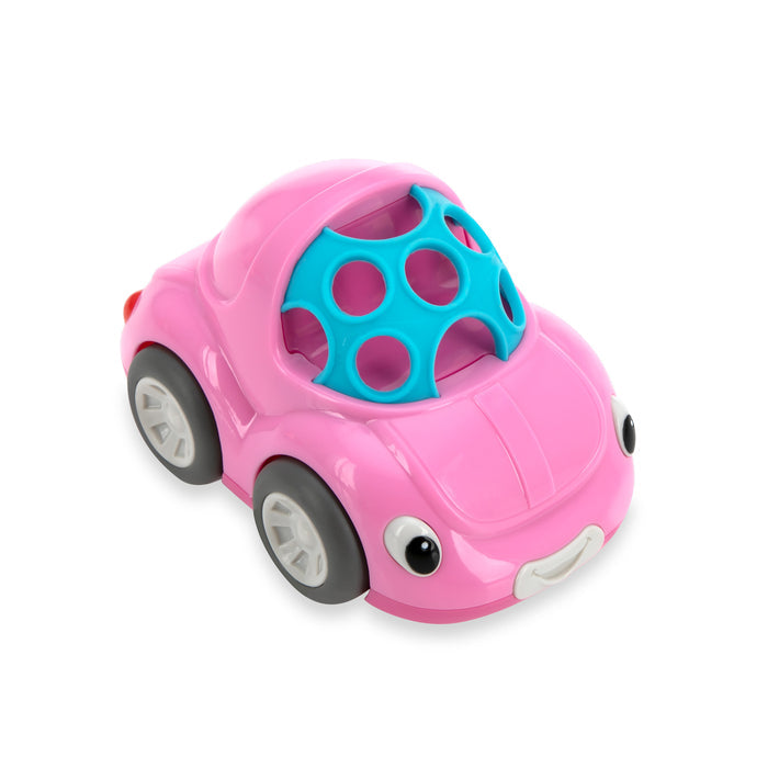 The Nuby Silly Shaker Rattle Toy - Bug Car is a pink toy car with big eyes, a smiling mouth, a blue hole-filled handle for easy grip, and four black and white wheels, designed to encourage hand–eye coordination.