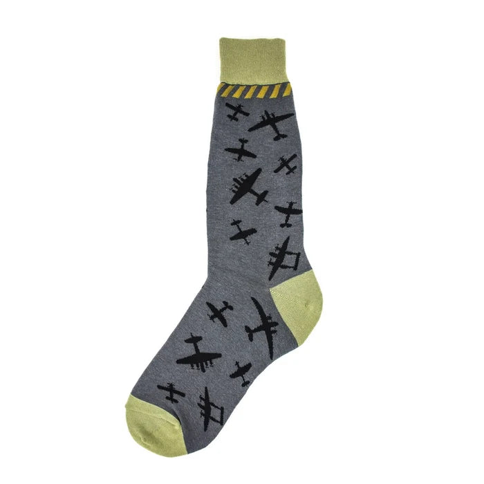 Gray sock with airplane pattern and green accents on a white background